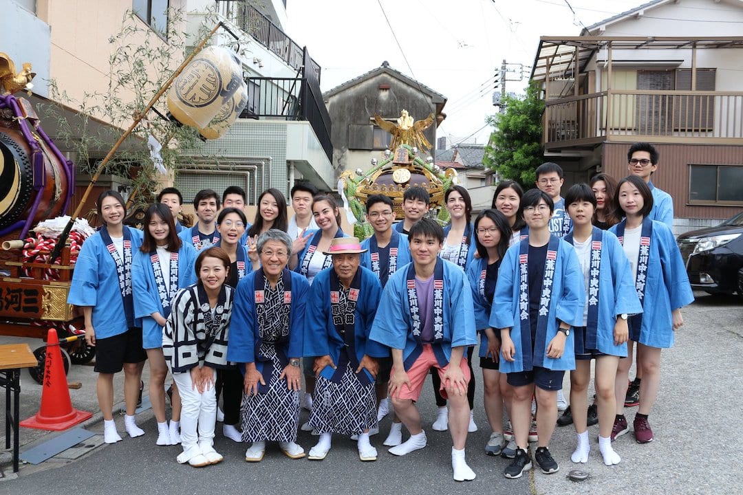 Akamonkai students dressed in Japanese festival wear outside during an event